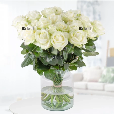 Send bouquet of white roses by courier to Sofia.