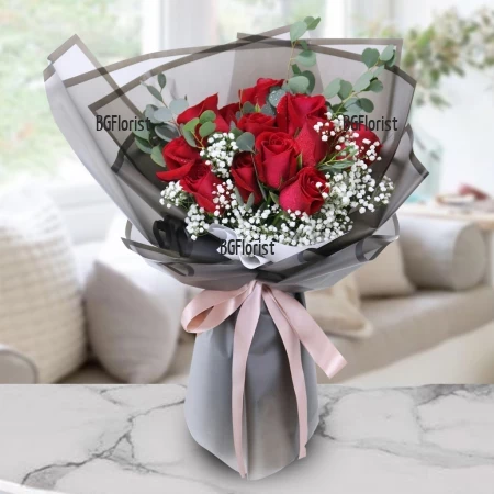 Send bouquet of red roses and greenery by courier to Varna