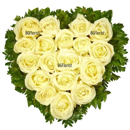 Send heart of white ecuadorian roses by courier