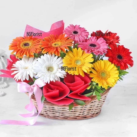 Send a basket with with colourful gerberas