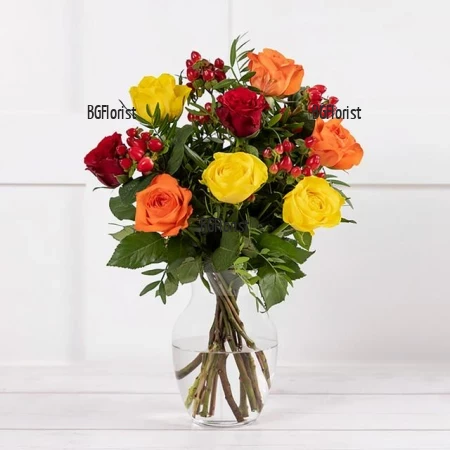 Delivery of a bouquet of colorful roses and greenery