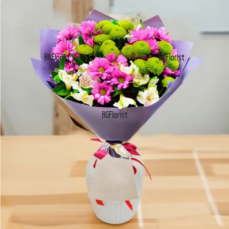 Low-cost bouquet of chrysanthemums and flowers