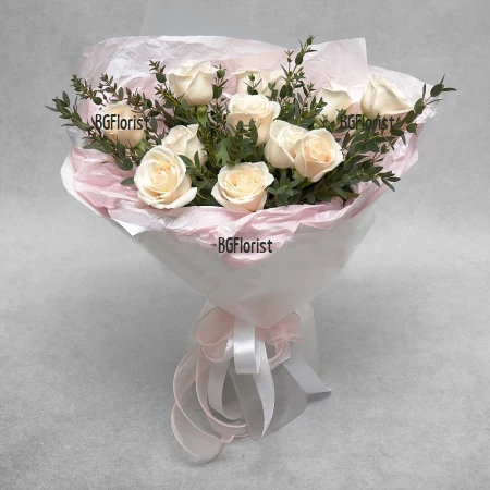 Send a bouquet of 11 white roses