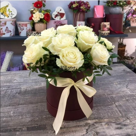 Send to Bulgaria 9 white roses in a round box