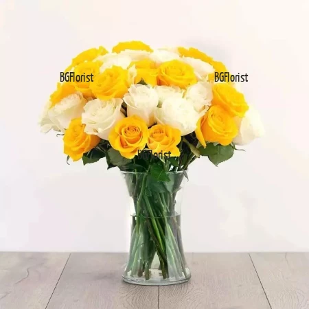 Online order and courier delivery of a bouquet of yellow and white roses